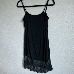 Black layering tank top with lace bottom.